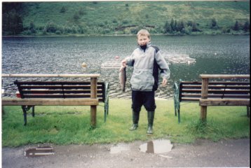 A young angler, 
pleased with his first rainbow trout!